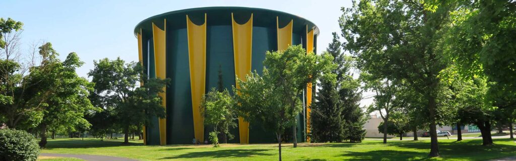 A photos of the Shadle Park Water Tower and trees surrounding the structure.